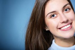 A young brunette woman with a beautiful and healthy smile